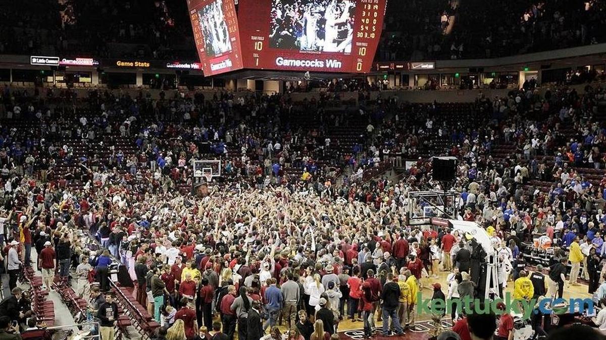 South Carolina fans rushed the court after beating Kentucky in men's basketball game at Colonial Life Arena in Columbia, S.C., on March 1, 2014. Kentucky lost 72-67 prompting USC fans to rush the court at the end of the game.