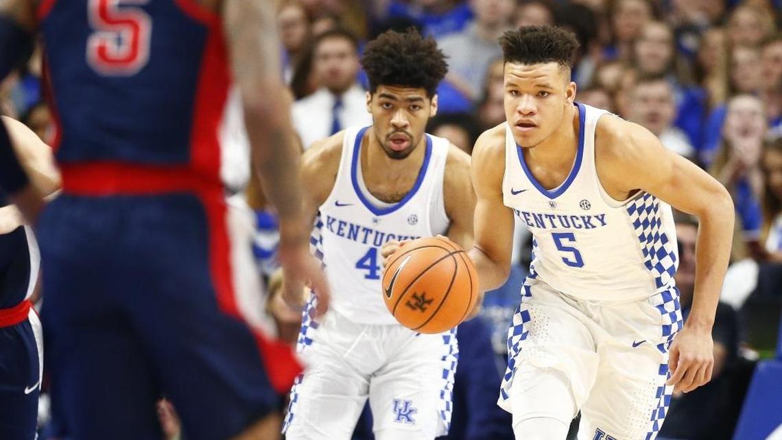 Kentucky freshman forward Kevin Knox (5) drove down court past Mississippi defenders during UK’s 96-78 win in their college basketball game on Wednesday, Feb. 28, 2018 in Rupp Arena.