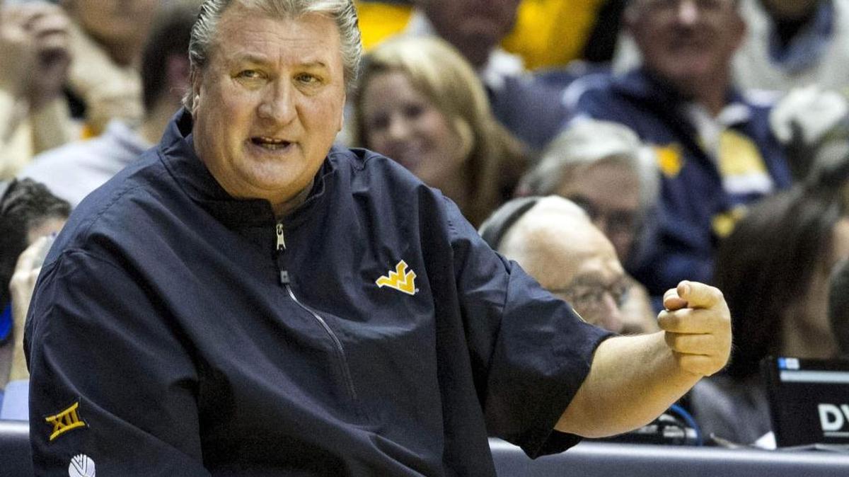 West Virginia coach Bob Huggins takes his Mountaineers to Austin for a Big 12 matchup with Texas on Tuesday night.
