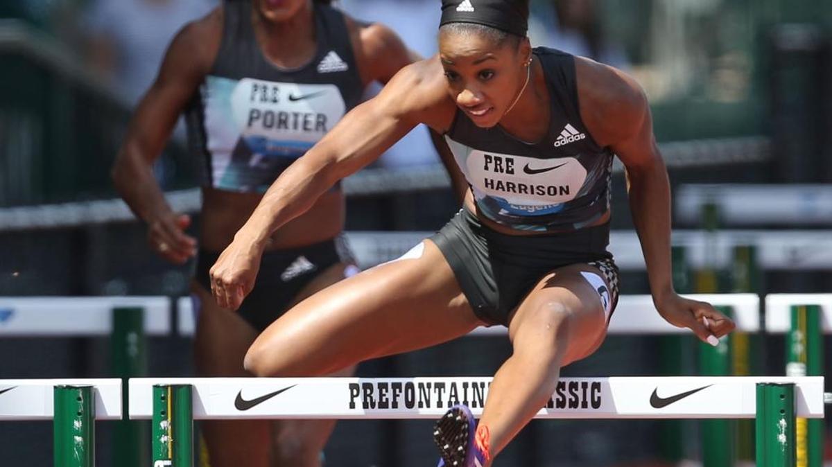 Former UK star Kendra Harrison, right, clears the last hurdle ahead of Tiffany Porter, left, and the rest of the field on her way to a win in the women's 100-meter hurdles at the Prefontaine Classic athletics meet in Eugene, Ore., Saturday, May 28, 2016. Her time set a new American record of 12.24 seconds, the second-fastest ever.