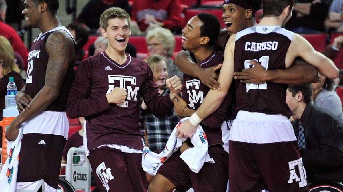 Texas A&M bench celebrates during the Aggies’ 79-45 win at Georgia last Saturday.