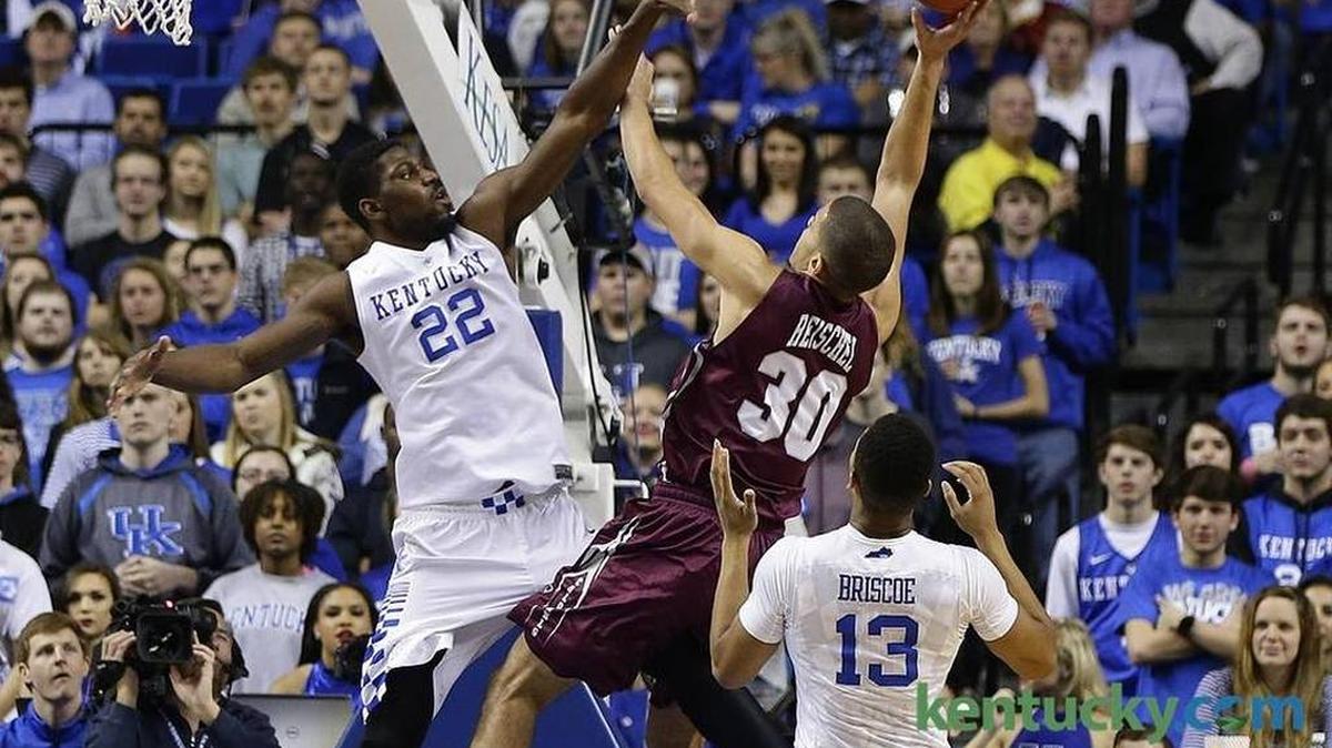 Kentucky Wildcats forward Alex Poythress (22) challenged the shot of Eastern Kentucky Colonels guard Jarelle Reischel (30) as Kentucky played Eastern Kentucky University at Rupp Arena.