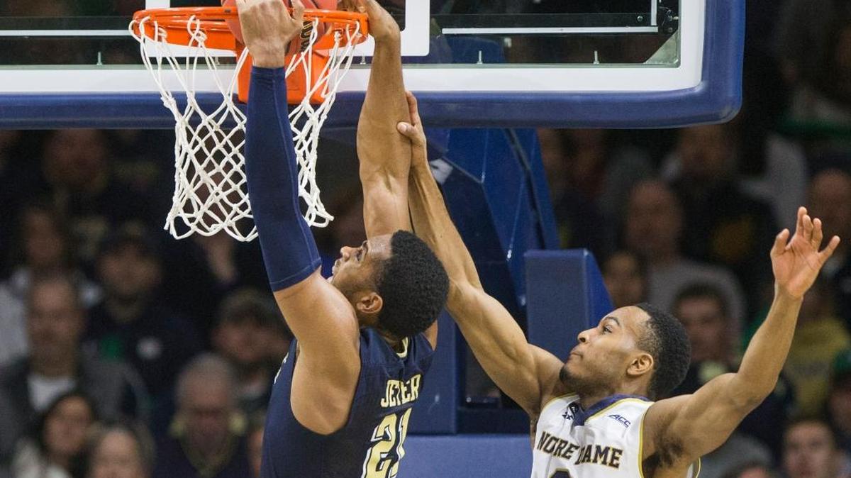 Notre Dame’s V.J. Beachem (3) fouls Pittsburgh’s Sheldon Jeter (21) who dunks during the second half of an NCAA college basketball game on Saturday, Jan. 9, 2016, in South Bend, Ind.