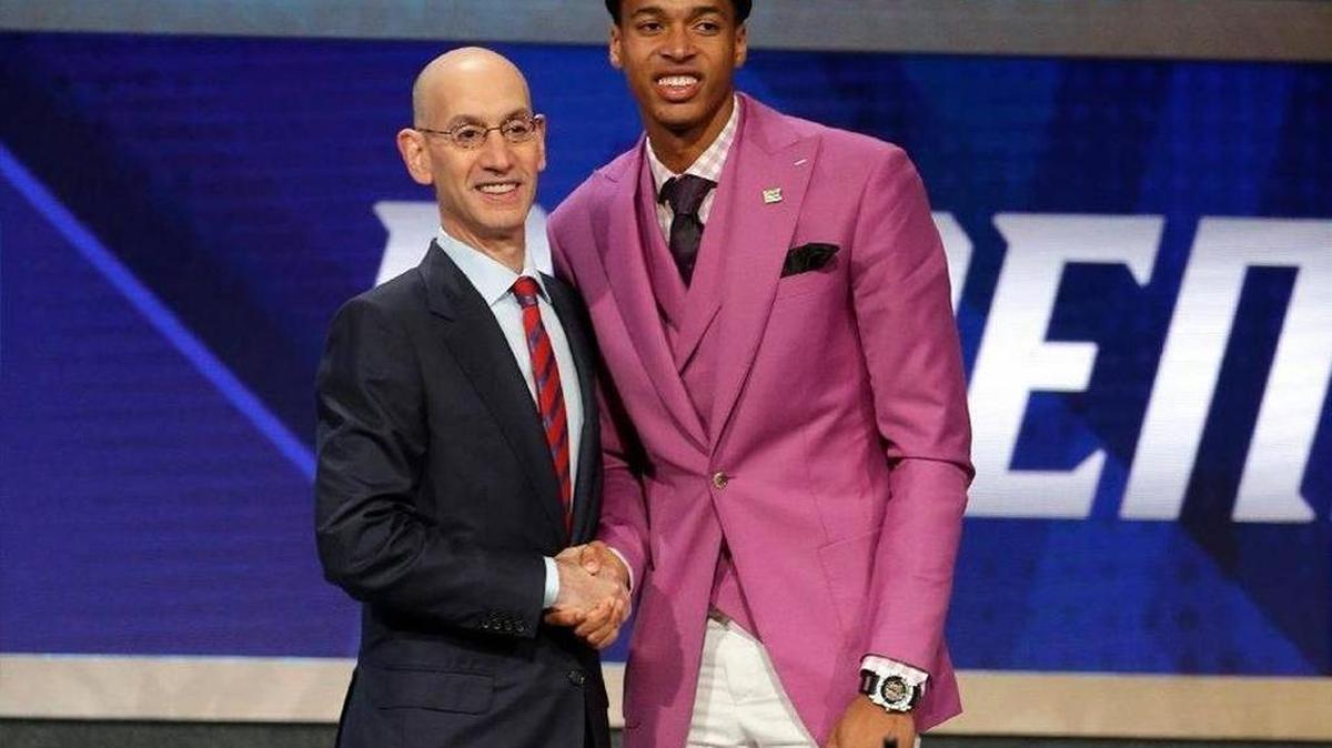 Skal Labissiere was congratulated by NBA Commissioner Adam Silver after Sacramento, via Phoenix, chose the ex-Kentucky center No. 28 in the first round of the 2016 NBA draft.