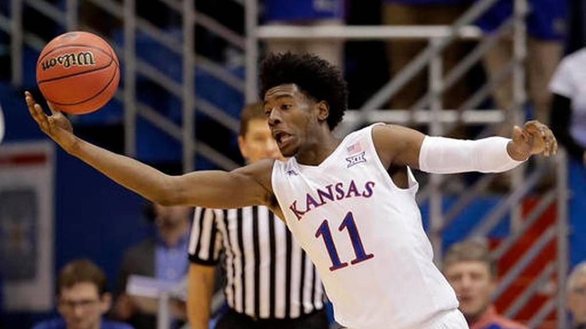 Kansas forward Josh Jackson chases a loose ball during the first half of the Jayhawks’ 87-80 win over Oklahoma State on Saturday, Jan. 14, 2017, in Lawrence, Kan. Jackson scored 20 points and grabbed 11 rebounds in the win.
