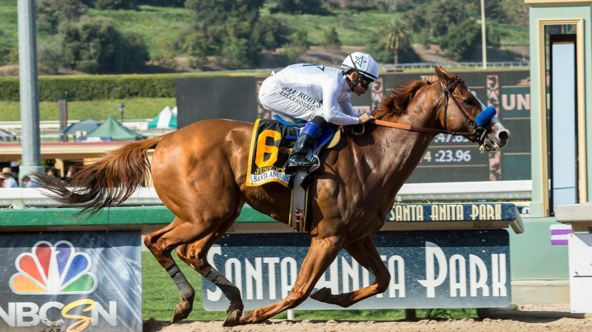 In a photo provided by Benoit Photo, Justify and jockey Mike Smith win the Santa Anita Derby on Saturday, April 7, 2018, at Santa Anita in Arcadia, Calif. Trained by Bob Baffert, Justify will be one of the favorites for the Kentucky Derby on May 5.