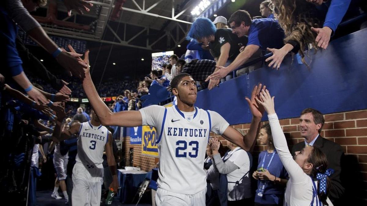 UK forward Anthony Davis is congratulated by fans as he leaves the court during game against Louisville on Saturday, Dec. 31,2011 at Rupp Arena in Lexington.