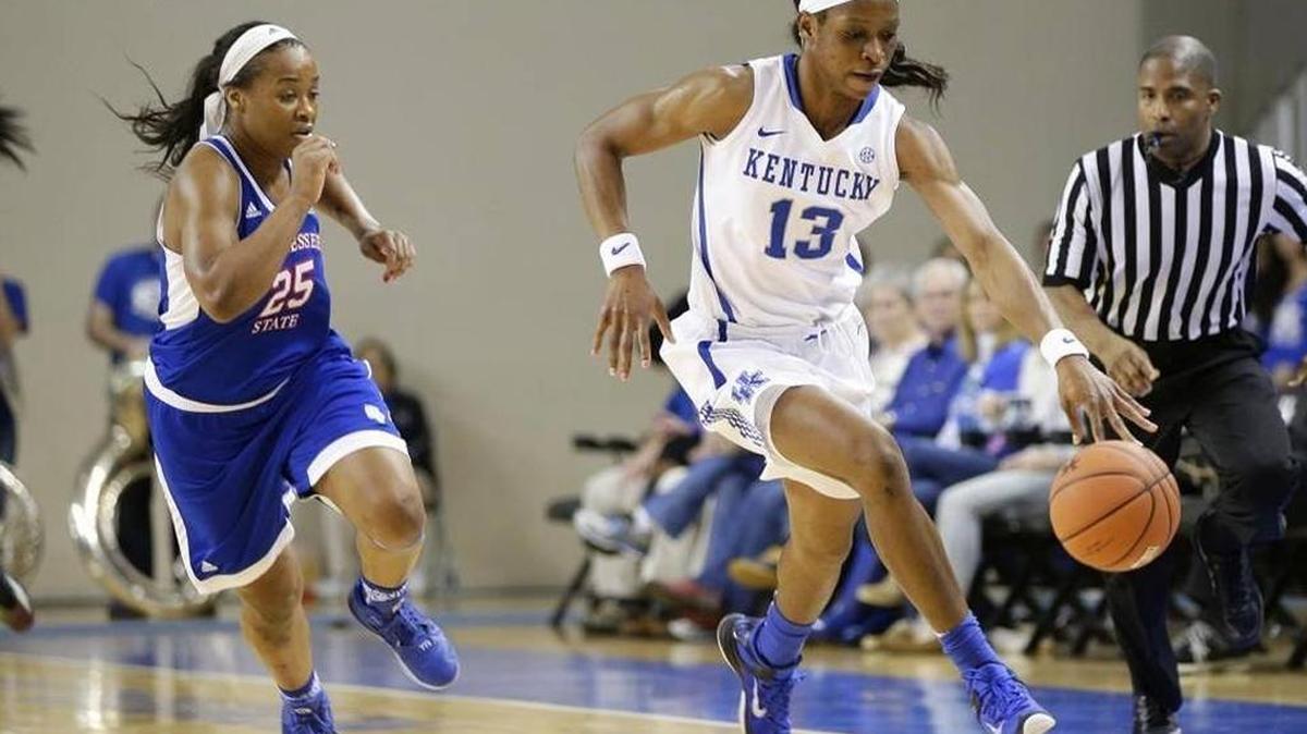 Kentucky forward Evelyn Akhator (13) stole the ball from Tennessee State forward Jayda Johnson (25) during the first half Monday, Dec. 28, 2015 in Lexington.