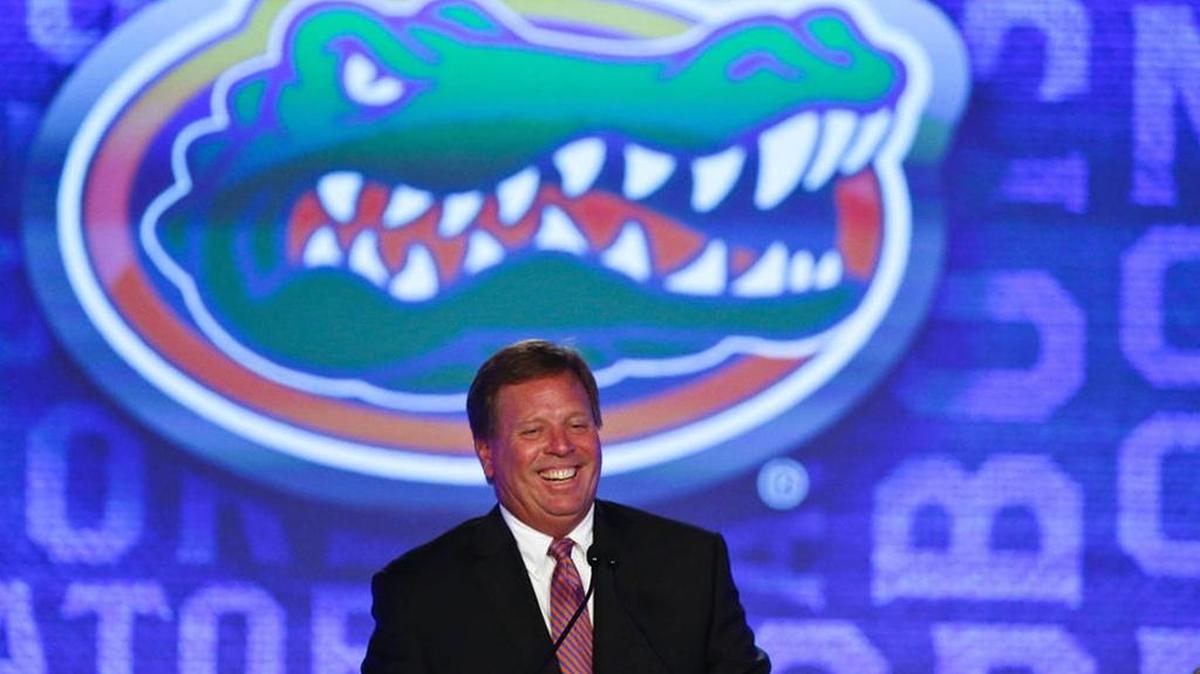 Florida coach Jim McElwain smiles will speaking to the media at SEC Football Media Days 2016 in Hoover, Alabama on Monday.