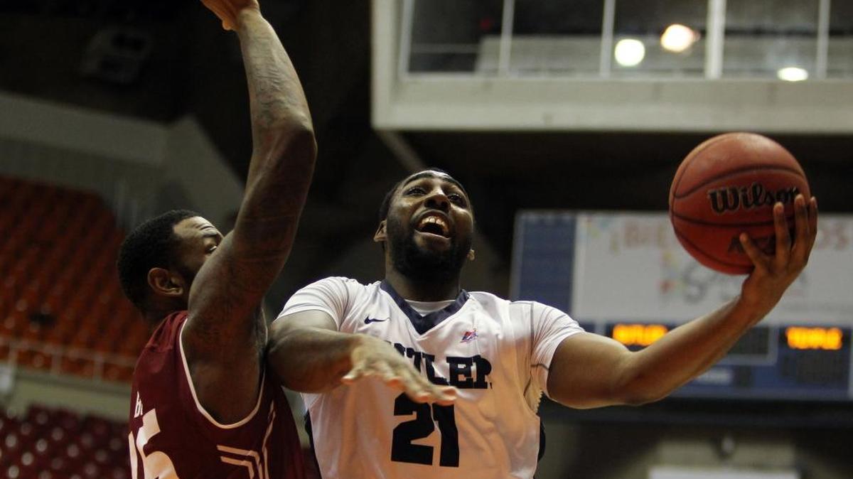 Butler guard Roosevelt Jones goes for a layup against Temple guard Quenton DeCosey, during the Puerto Rico Tip-Off college basketball tournament in San Juan, Friday, Nov. 20, 2015.