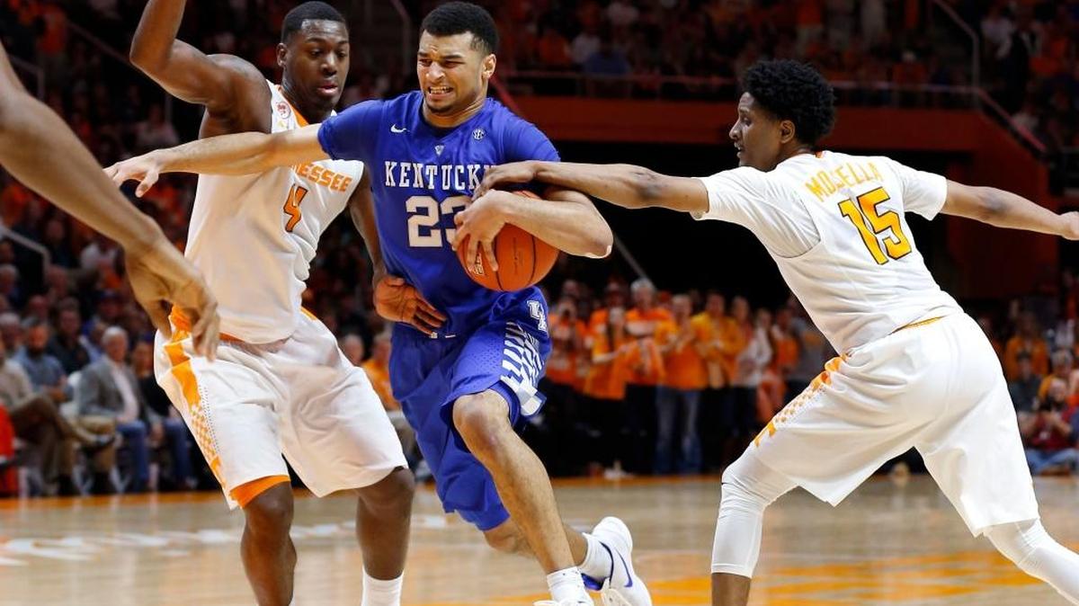 Kentucky guard Jamal Murray (23) drove as Tennessee forward Armani Moore (4) and guard Detrick Mostella (15) reached in as the University of Kentucky played the University of Tennessee in Thompson-Boling Arena in Knoxville, Tn., Tuesday, February 02, 2016. Tennessee won 84-77.