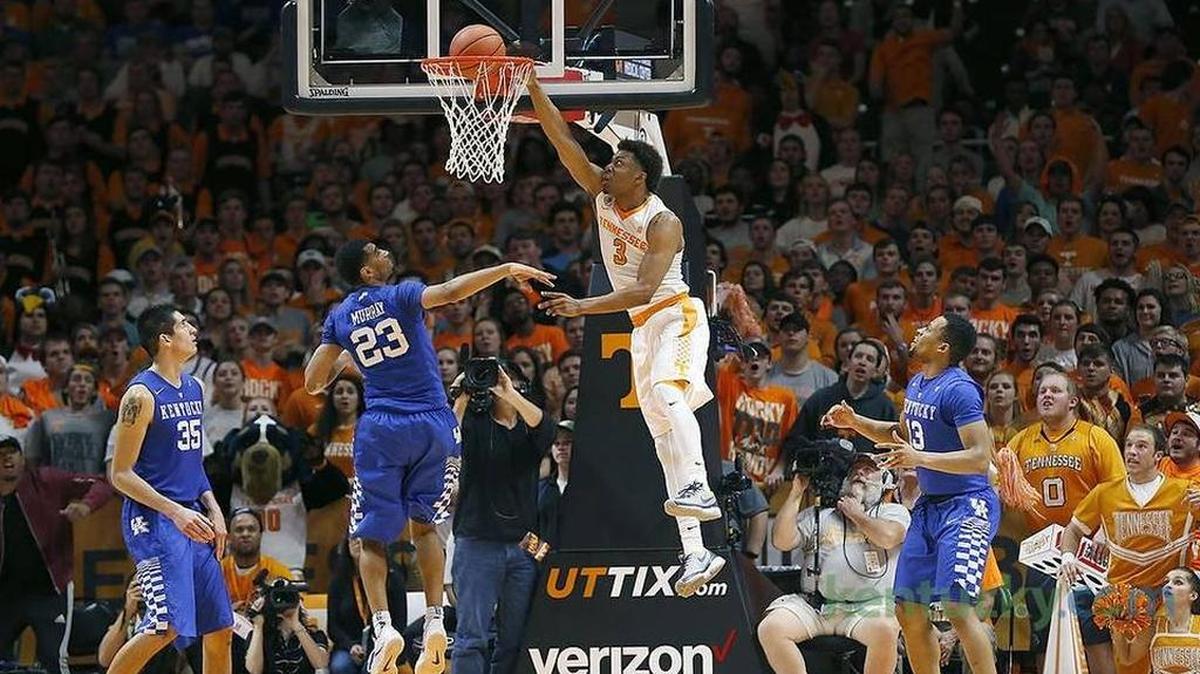 Kentucky Wildcats forward Derek Willis (35), Kentucky Wildcats guard Jamal Murray (23) and Kentucky Wildcats guard Isaiah Briscoe (13) watched as /t3 dunked as the University of Kentucky played the University of Tennessee in Thompson-Boling Arena in Knoxville, Tn., Tuesday, February 02, 2016. This is second half men's college basketball action. Tennessee won 84-77.