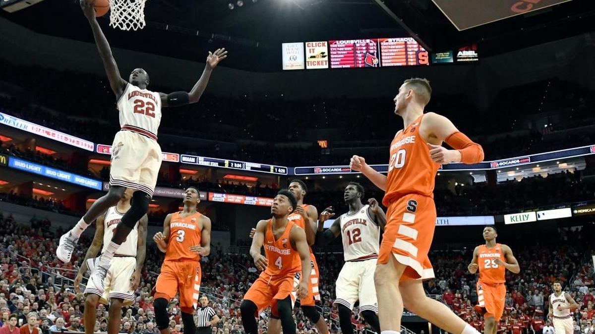 Louisville’s Deng Adel (22) drives in for a layup during the second half of the Cardinals’ 88-68 win over Syracuse at the KFC Yum Center on Sunday, Feb. 26, 2017, in Louisville, Ky.