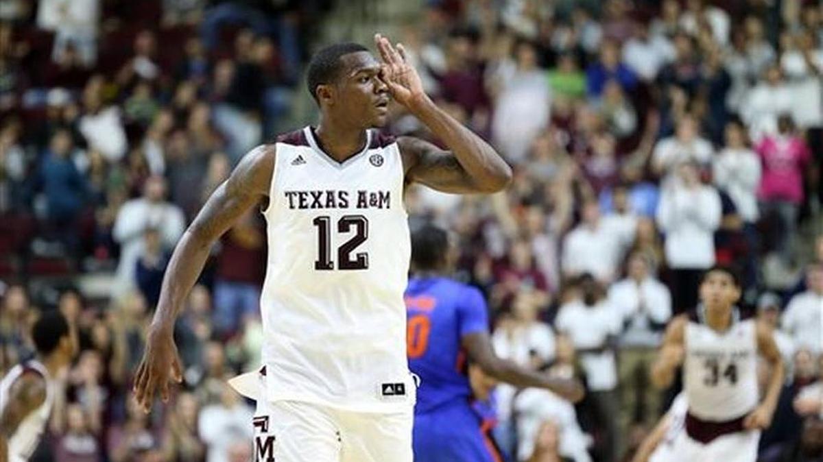 Texas A&M's Jalen Jones (12) makes a three point gesture over his eye after hitting a three point basket at the buzzer of the first half of an NCAA college basketball game against Florida, Tuesday, Jan. 12, 2016, in College Station, Texas.