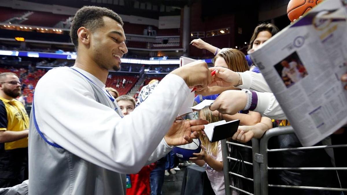 Kentucky Wildcats guard Jamal Murray (23) signed autographs after the University of Kentucky practiced for their NCAA opening round game in Wells Fargo Arena in Des Moines, IA, Wednesday, March 16, 2016. UK plays Stony Brook Thursday night in a first round NCAA tournament game.