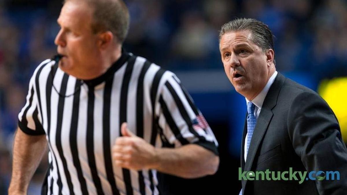 Kentucky head coach John Calipari jaws at the officials as they run up the court in the first half of Tuesday night’s game against Georgia.