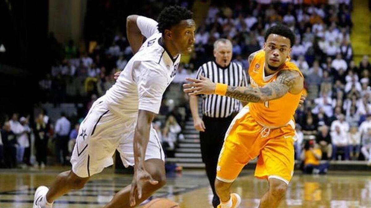 Vanderbilt guard Saben Lee, left, drives against Tennessee guard Lamonte Turner during the first half of Vandy’s 92-84 loss in an NCAA college basketball game Tuesday, Jan. 9, 2018, in Nashville, Tenn. Lee scored 21 points.