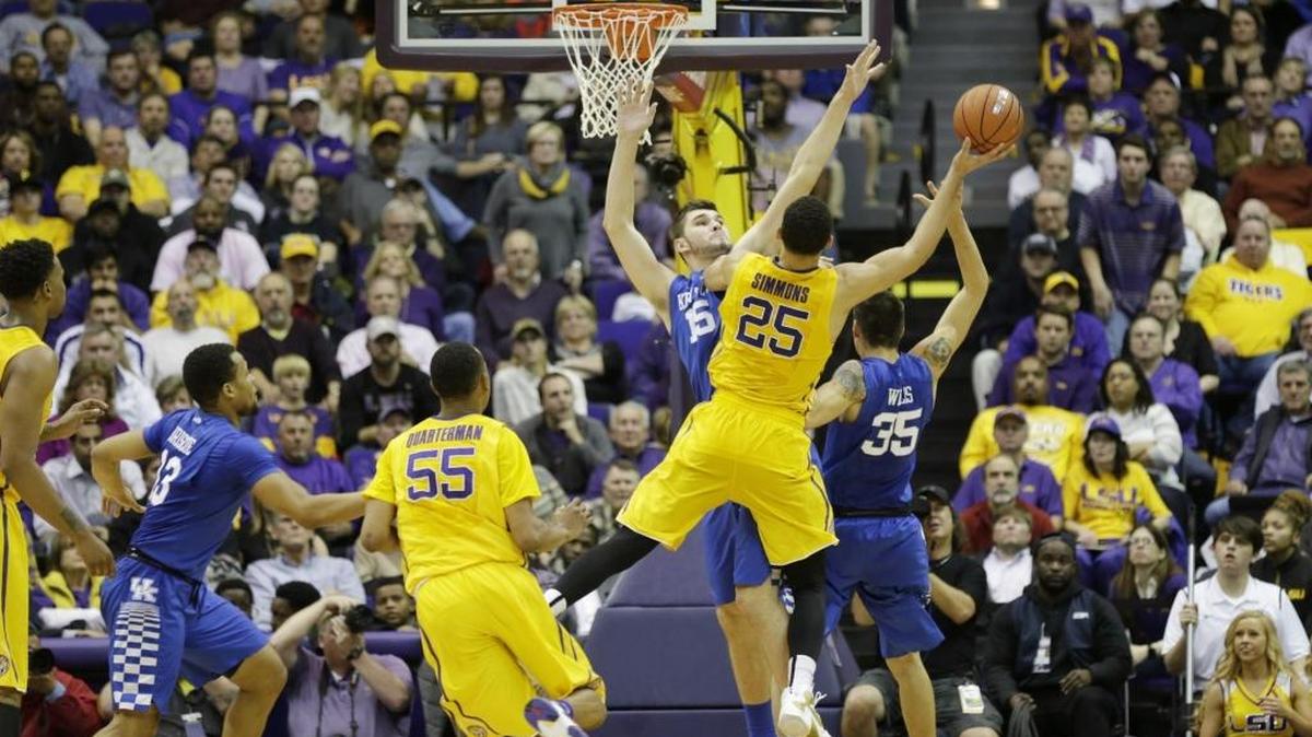 LSU forward Ben Simmons (25) scored past Kentucky forward Isaac Humphries (15) in the second half of the Kentucky at LSU basketball game at Pete Maravich Assembly Center in Baton Rogue, La.,, on Jan. 6, 2016. LSU beat UK 85-67
