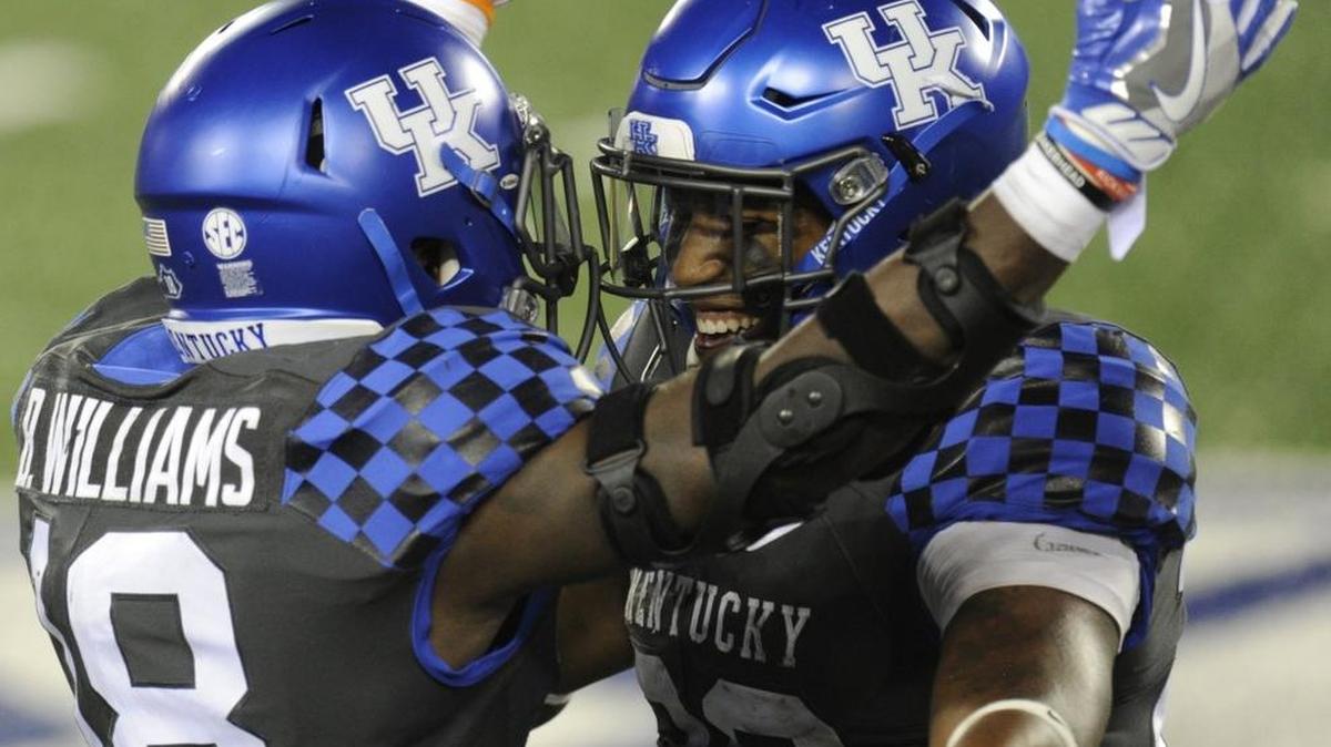 Kentucky running back Boom Williams congratulates fellow running back Benny Snell, Jr. after his one -yard touchdown run during UK’s 17-10 win over South Carolina at Commonwealth Stadium on Saturday, Sept. 24, 2016.