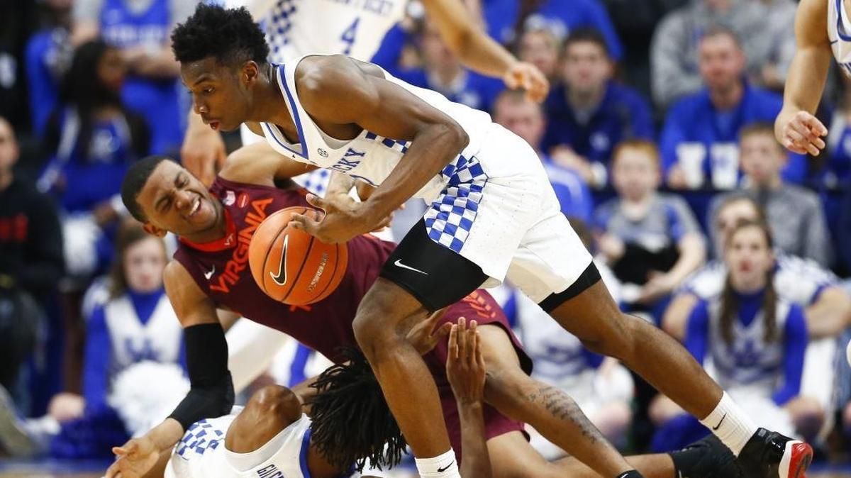 Kentucky guard Hamidou Diallo (3) recovers a loose ball past Virginia Tech Hokies guard Nickeil Alexander-Walker (4) during Uks 93-86 win at Rupp Arena in Lexington, Ky., Saturday, Dec. 16, 2017. Kentucky forced 19 turnovers in the victory.