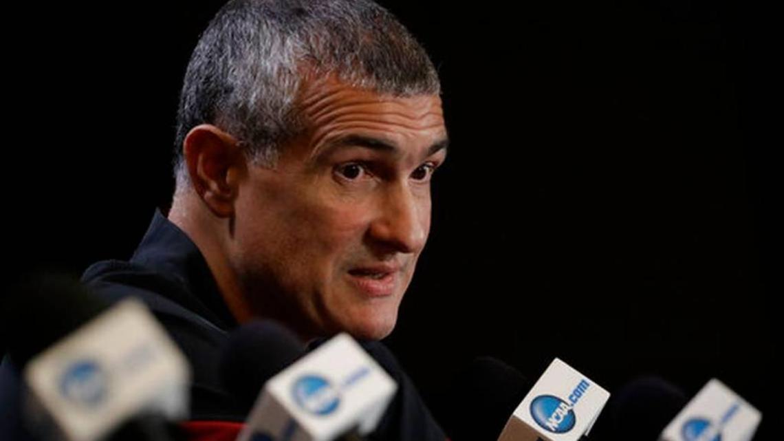 South Carolina basketball coach Frank Martin addresses the media at the Final Four in April. Martin said Thursday that he is not surprised by allegations made in a federal investigation into college basketball recruiting. He said he was heartbroken over the arrest of former assistant coach Lamont Evans.