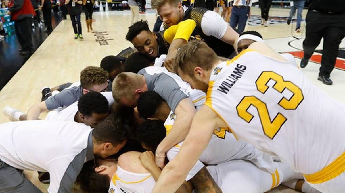Northern Kentucky players celebrate their 59-53 victory over Milwaukee after the Horizon League NCAA college basketball tournament championship game in Detroit, Tuesday, March 7, 2017. NKU plays Kentucky on Friday night in the first round fo the NCAA Tournament.