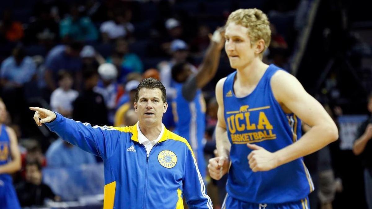 UCLA head basketball coach Steve Alford instructs Bruins center Thomas Welsh (40) as UCLA practiced at FedExForum in Memphis, Tn., Thursday, March 23, 2017. Kentucky defeated UCLA in the Sweet 16 of the 2017 NCAA Tournament. The two teams play again Saturday in New Orleans.