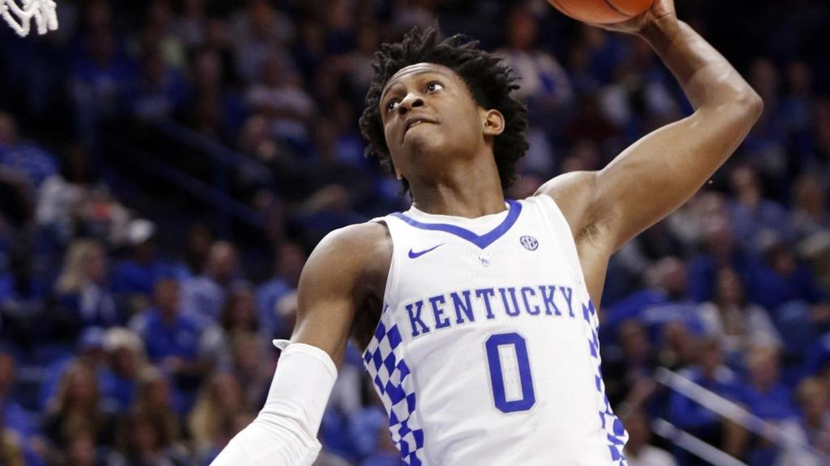 Kentucky’s De’Aaron Fox goes up for a dunk during the second half of an NCAA college basketball exhibition game against Asbury, in Lexington, Ky.