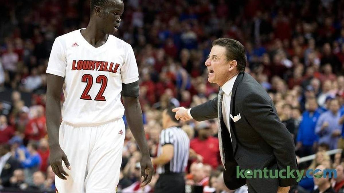 Louisville head coach Rick Pitino yells instructions to forward Deng Adel (22) during the Cardinals’ 73-70 win over Kentucky at the KFC Yum Center on Dec. 21, 2016.