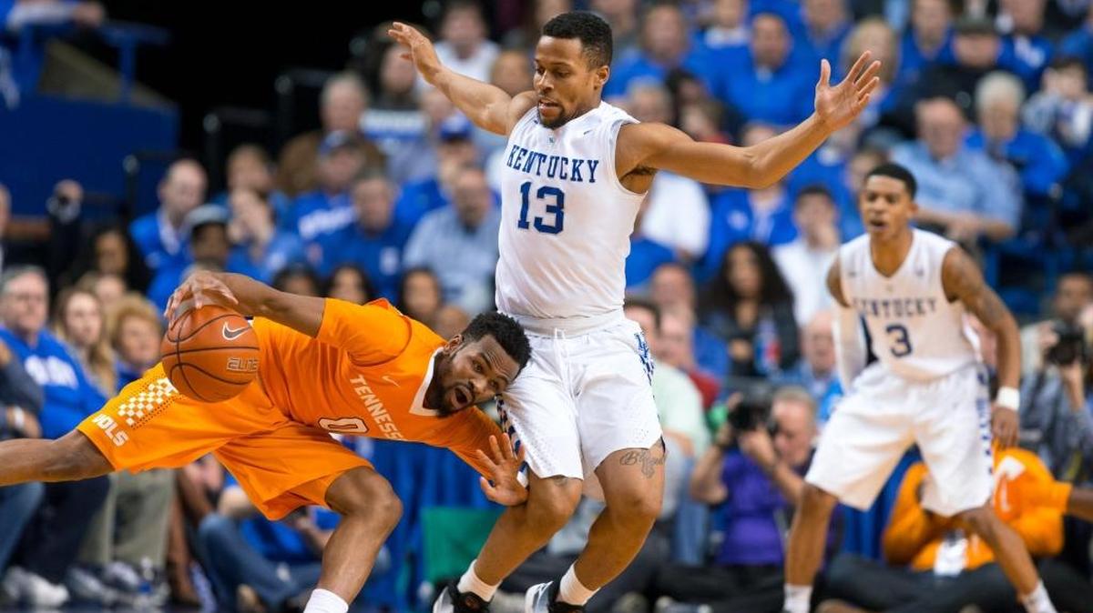 Tennessee guard Kevin Punter, left, loses control of his dribble with pressure from Kentucky guard Isaiah Briscoe in the second half. The University of Kentucky hosted the University of Florida, Thursday, Feb. 18, 2016 at Rupp Arena in Lexington .