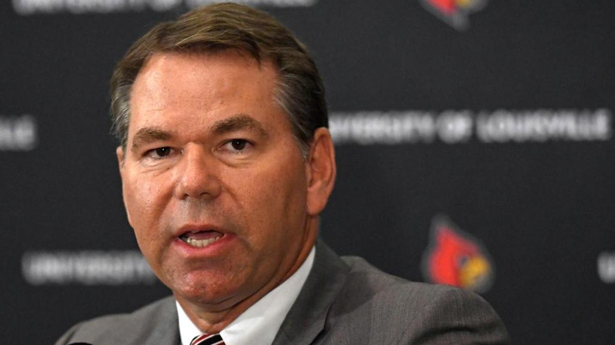 Vince Tyra speaks to reporters after being named acting athletic director at Louisville, Tuesday, Oct. 3, 2017, in Louisville, Ky. Tyra played baseball at the University of Kentucky.