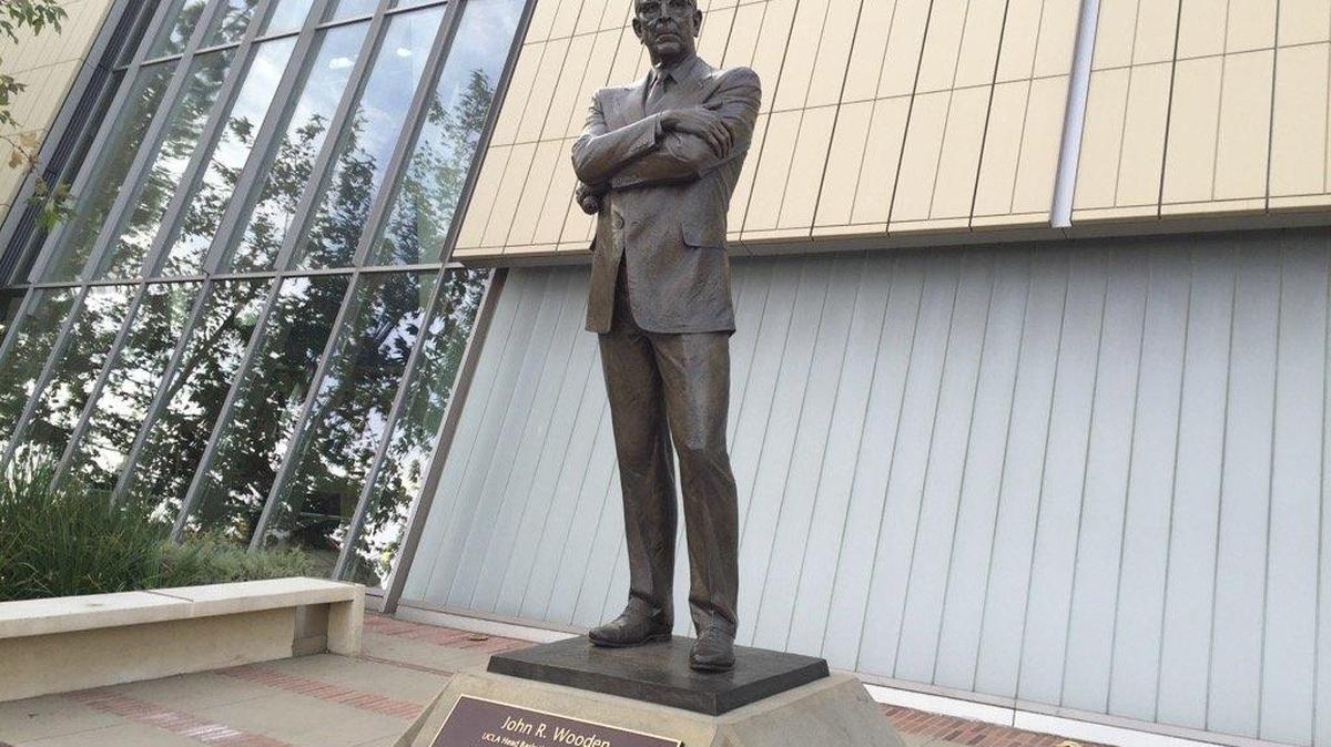 Statue of John Wooden outside Pauley Pavilion