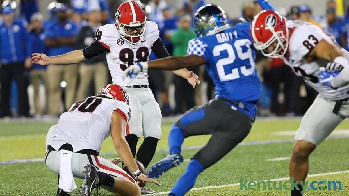 Georgia’s Rodrigo Blankenship kicks the game-winning 25-yard field goal as the Bulldogs beat Kentucky 27-24 at Commonwealth Stadium on Nov. 5, 2016.