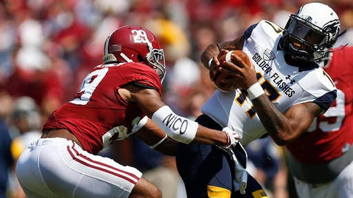 Alabama defensive back Minkah Fitzpatrick sacks Kent State quarterback Mylik Mitchell in the first half during an NCAA college football game, Saturday, Sept. 24, 2016, in Tuscaloosa, Ala.