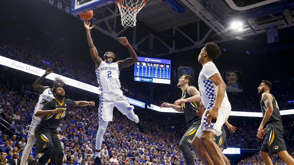 Kentucky forward Jarred Vanderbilt (2) jumped for a rebound past Missouri forward Kevin Puryear (24) during their game Saturday in Rupp Arena. UK beat the Tigers 87-66 as Vanderbilt scored 11 points and grabbed 15 rebounds.