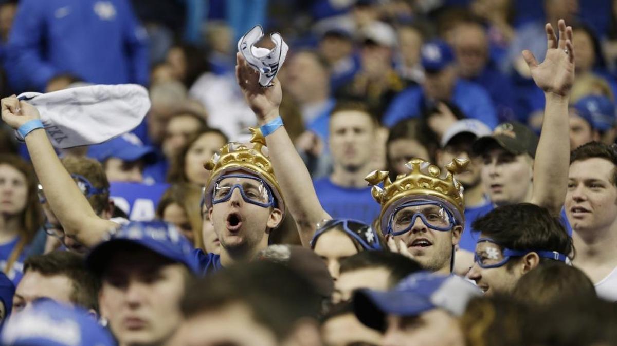 Fans in the eRUPPtion Zone wore jockey goggles given out by Keeneland in the first before the LSU at Kentucky men's basketball game at Rupp Arena in Lexington, Ky, on March 5, 2016. Attendance for the first two games of 2017-18 has been down.