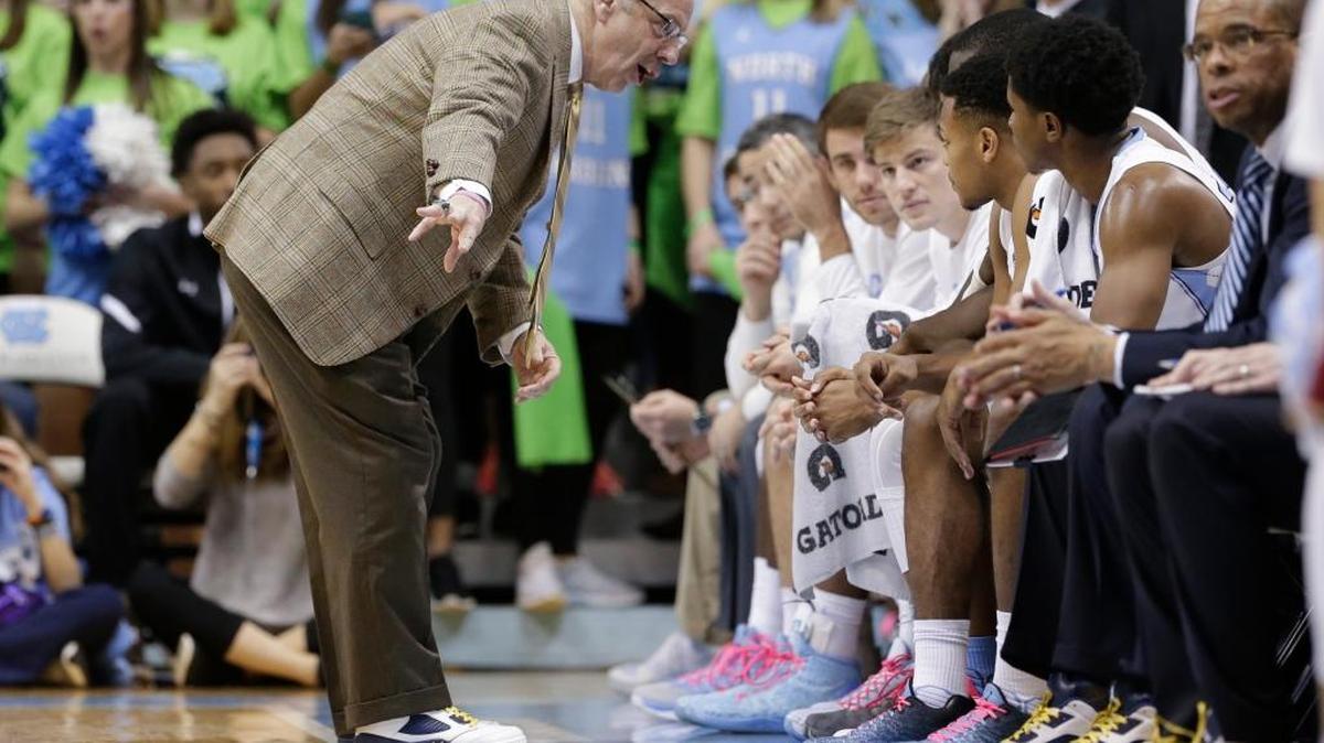 North Carolina coach Roy Williams speaks with his team during the second half of an NCAA college basketball game against Boston College in Chapel Hill, N.C., Saturday, Jan. 30, 2016. North Carolina won 89-62.