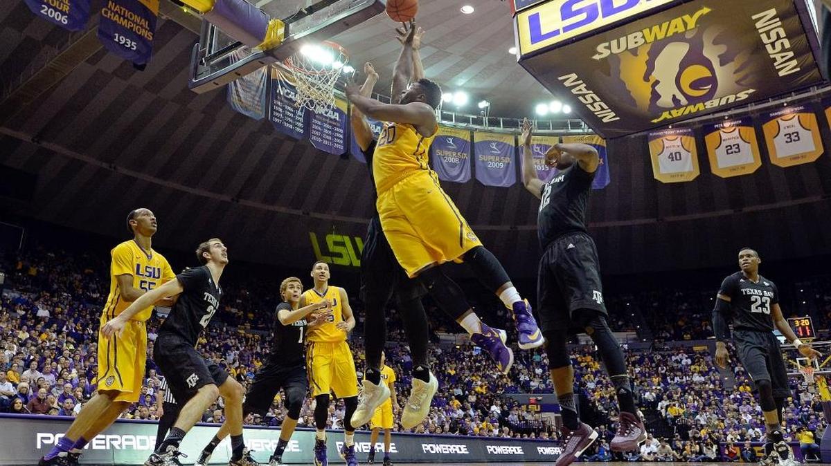 LSU forward Brian Bridgewater (20) puts the ball up for two points in the first half of an NCAA college basketball game against Texas A&M in Baton Rouge, La., Saturday, Feb. 13, 2016. LSU won 76-71.