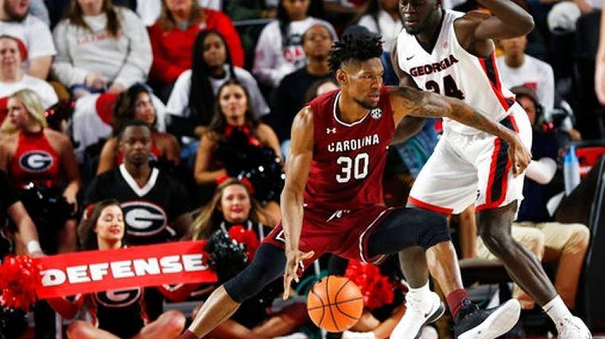 South Carolina’s Chris Silva drives around Georgia’s Derek Ogbeide during South Carolina’s 64-57 win in an NCAA college basketball game on Jan. 13, 2018 in Athens, Ga. Silva scored 14 points for the Gamecocks.