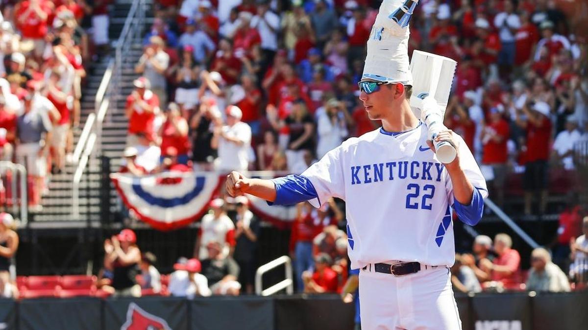 Kentucky’s Austin Keen (22) welcomes teammates back to the dugout in the ninth inning during UK’s 6-2 loss to Louisville in an NCAA baseball super regional at Jim Patterson Stadium in Louisville, Ky., Saturday, June 10, 2017. Louisville beat Kentucky 6-2.