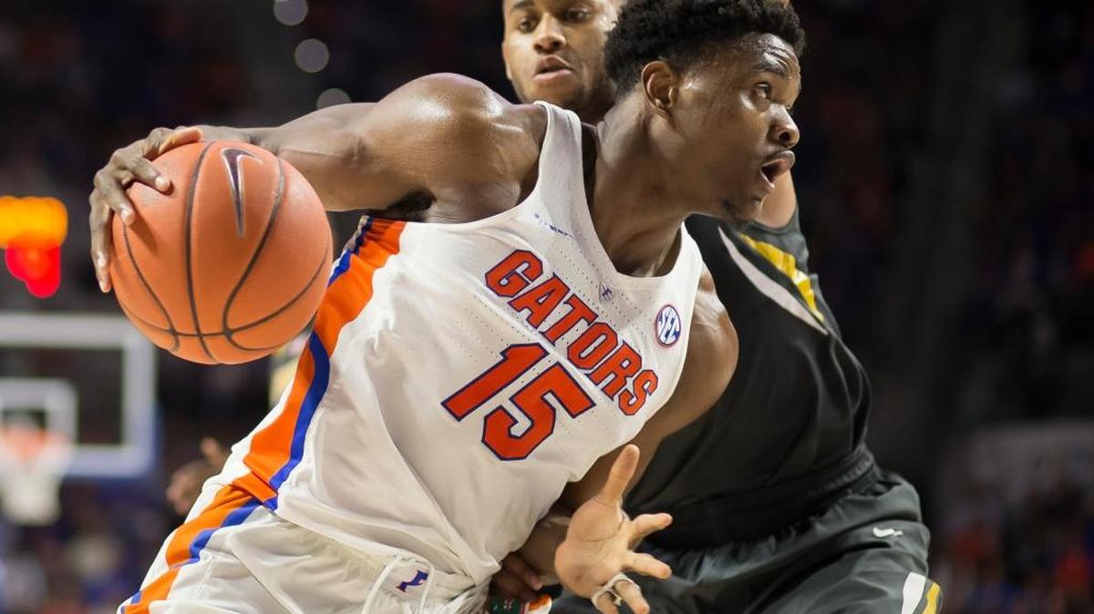 Florida center John Egbunu (15) drives past Missouri forward Russell Woods during the second half of Florida’s 93-54 win in Gainesville, Fla., Thursday, Feb. 2, 2017. Florida won 93-54.