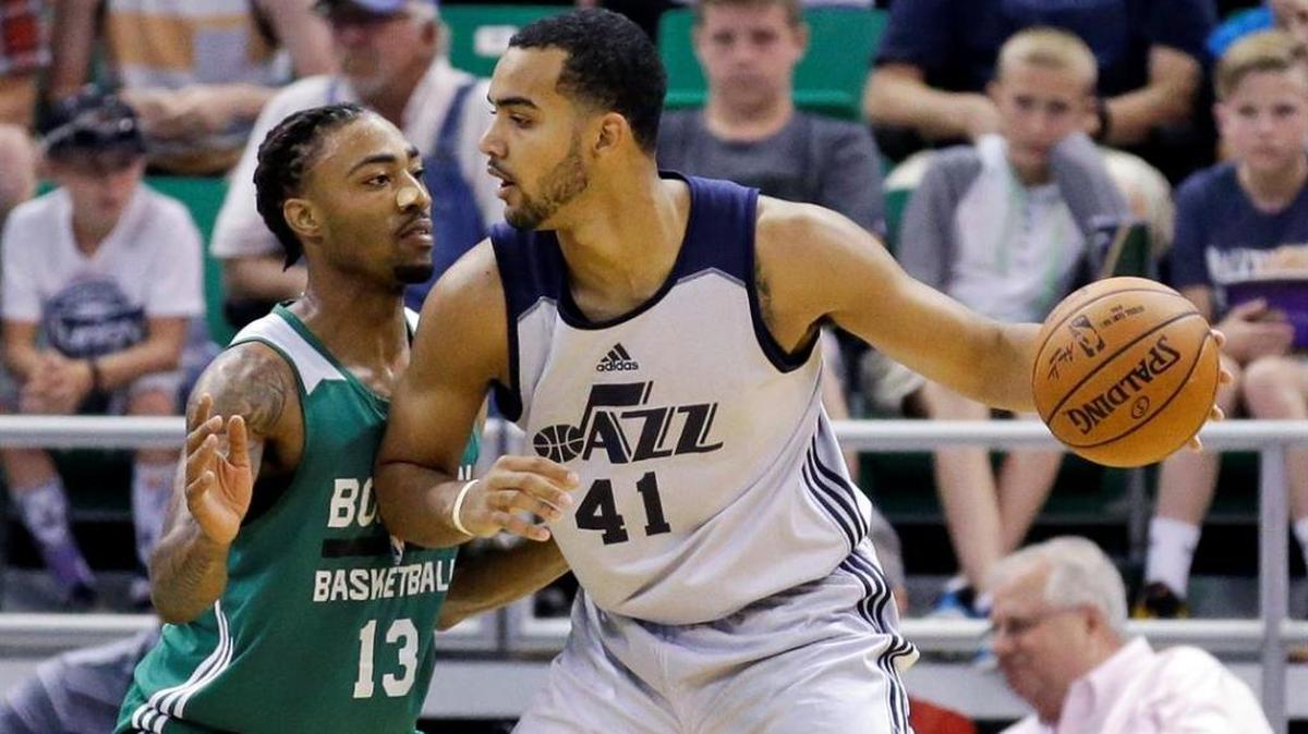 James Young of the Boston Celtics defends Trey Lyles of the Utah Jazz in an NBA Summer League game in Salt Lake City on July 5, 2016. Both Young and Lyles played at the University of Kentucky.