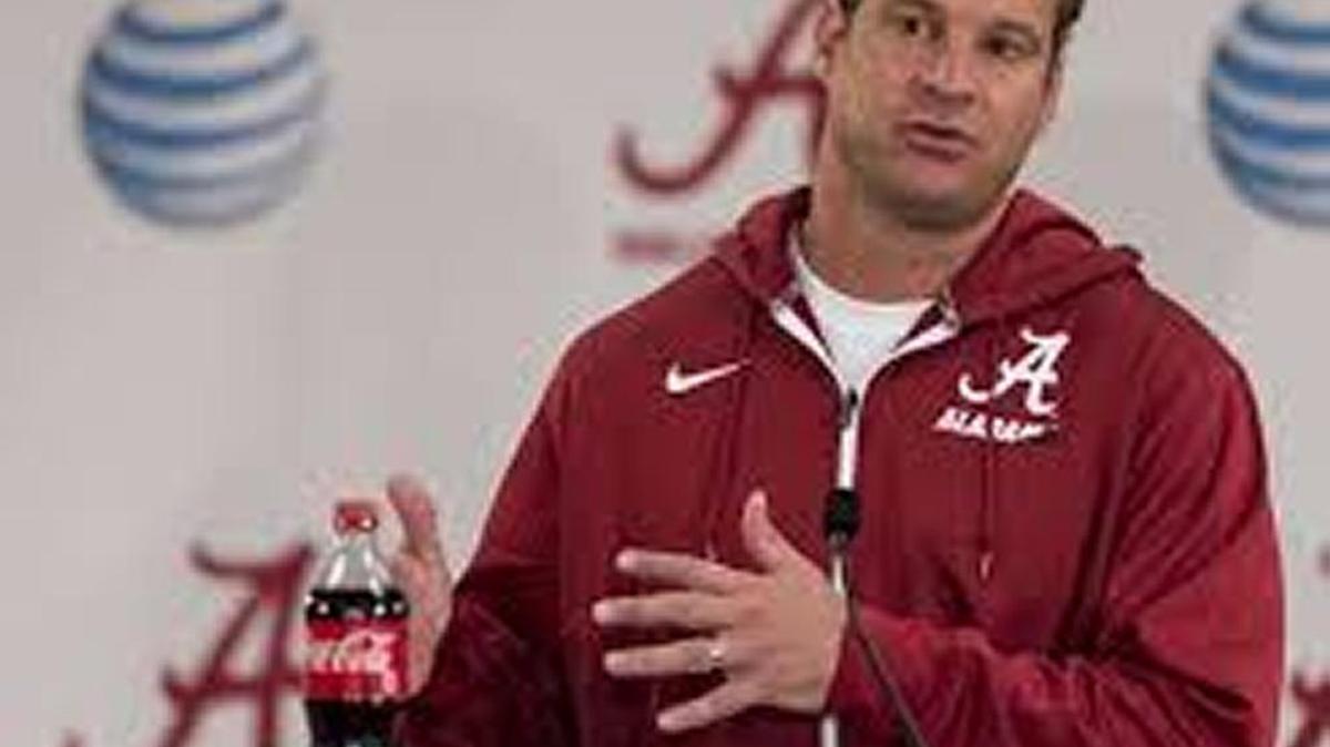 Alabama offensive coordinator Lane Kiffin talks to the media during the Crimson Tide’s 2015 Media Day in August.