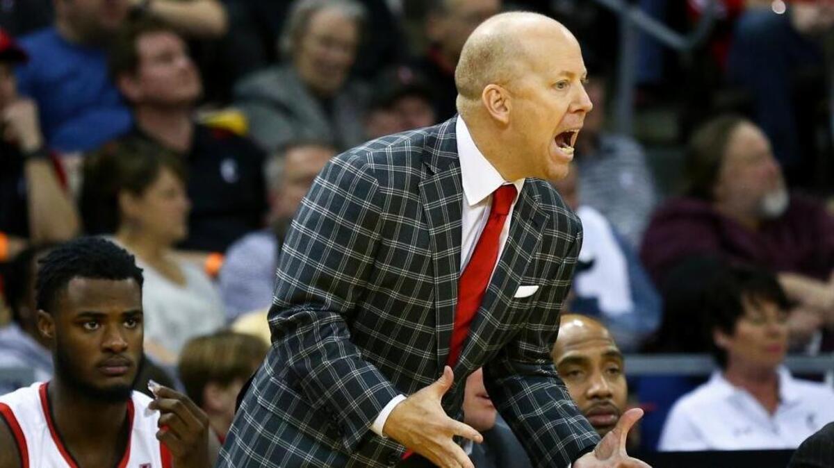 Cincinnati head coach Mick Cronin reacts from the bench during the second half of his team’s 82-74 win over Tulsa in an NCAA college basketball game on Sunday, Feb. 25, 2018, in Highland Heights, Ky.