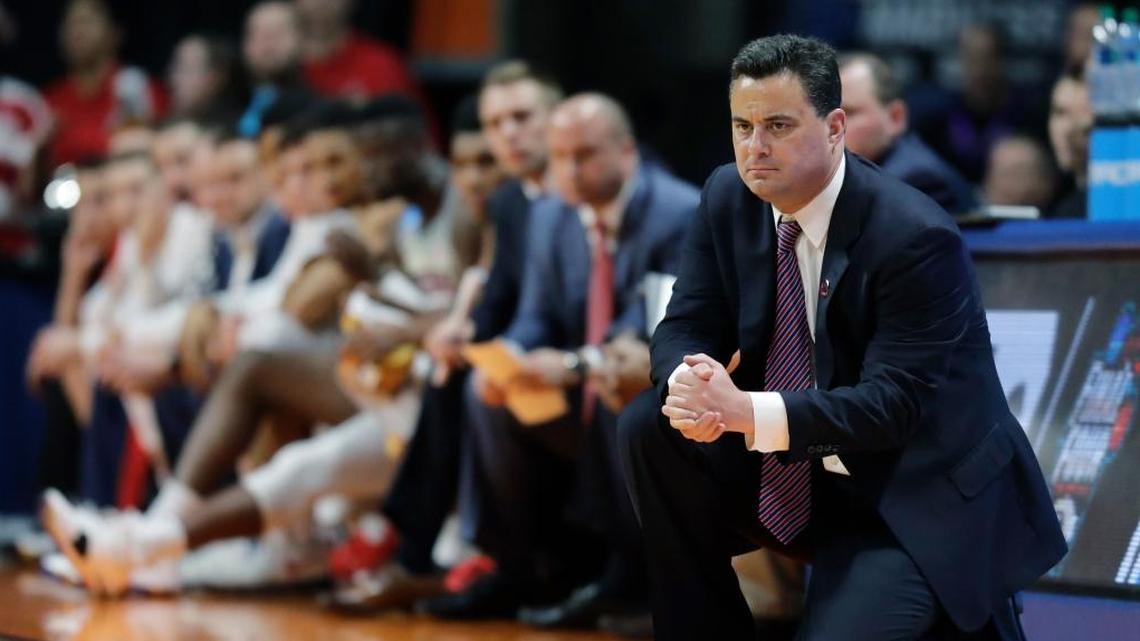 Arizona coach Sean Miller kneels by the bench during the first half of his team’s 89-68 loss to Buffalo in a first-round game in the NCAA men’s college basketball tournament Thursday, March 15, 2018, in Boise, Idaho.