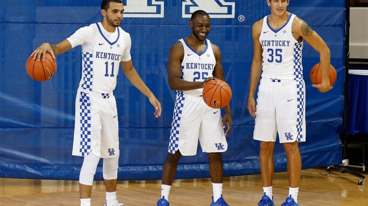 Seniors Mychal Mulder (11), Dominique Hawkins (25) and Derek Willis (35) during the University of Kentucky's men's basketball photo day held in Memorial Coliseum in Lexington, Ky., Thursday, September 15, 2016.