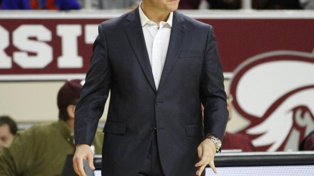 In this Nov. 8, 2015, photo Eastern Kentucky's Dan McHale looks on from the sidelines during an NCAA college basketball exhibition game in Richmond, Ky. Eastern Kentucky has a new coach on the sidelines for the first time in a decade.