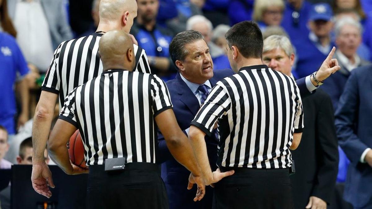 Kentucky Wildcats head coach John Calipari talked with the refs late in the game during second half action as the University of Kentucky played Indiana University in the 2nd round of the 2016 NCAA Men's Division I Basketball Tournament in Wells Fargo Arena in Des Moines, IA, Saturday, March 19, 2016. Indiana won 73-67.