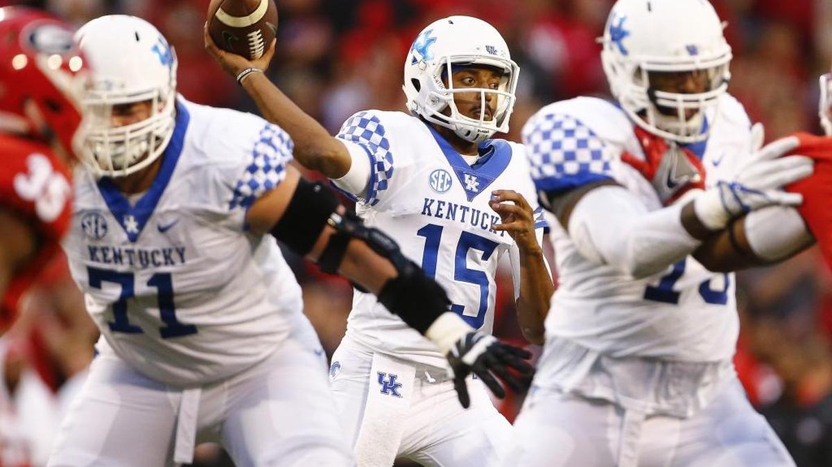 Kentucky quarterback Stephen Johnson (15) drops back to pass the ball during UK’s 42-13 loss at to the Georgia Bulldogs at Sanford Stadium in Athens, Ga., Saturday, Nov. 18, 2017.