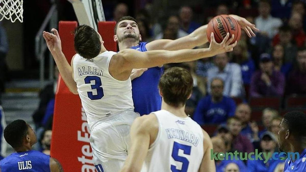 Kentucky freshman Isaac Humphries blocks a driving shot by Duke’s Grayson Allen during UK’s 74-63 win over the Blue Devils in the Champions Classic in Chicago on Nov. 17, 2015.